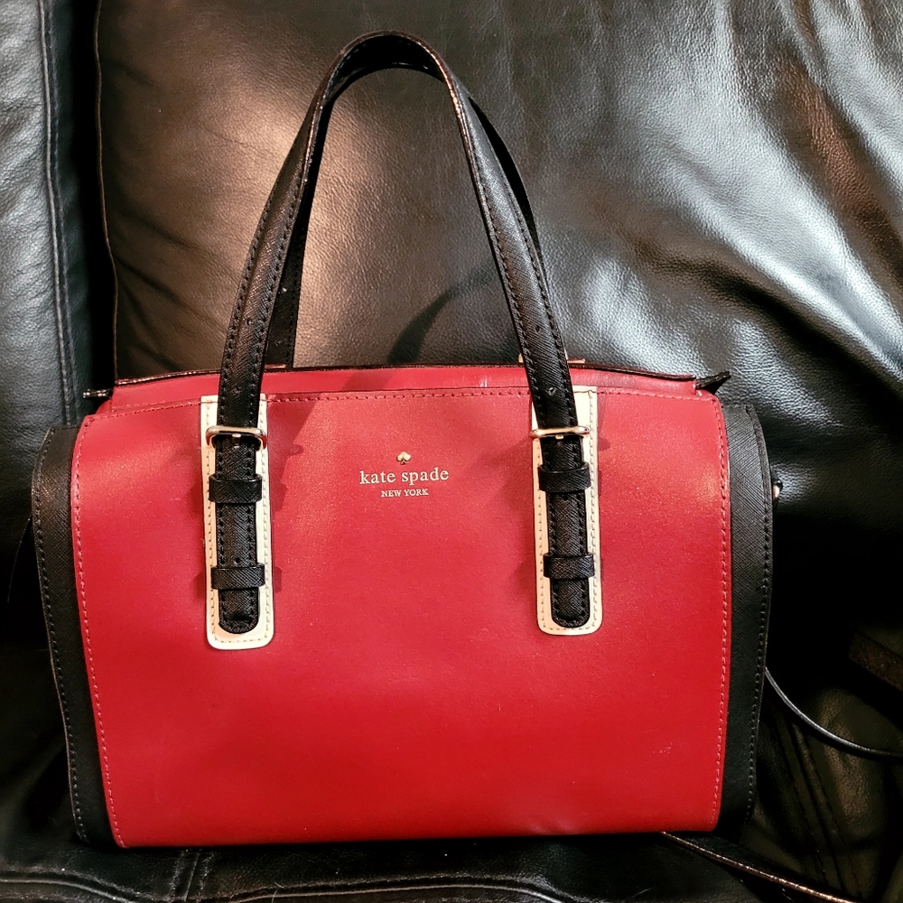 Kate spade Bag.. cherry and black color . In like new condition. NO Call outs